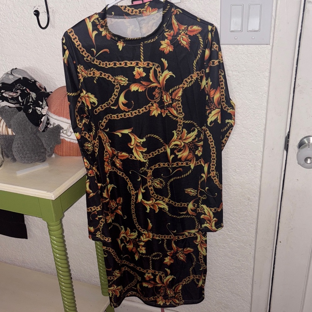 Elegant Black and Gold Chain Print Dress